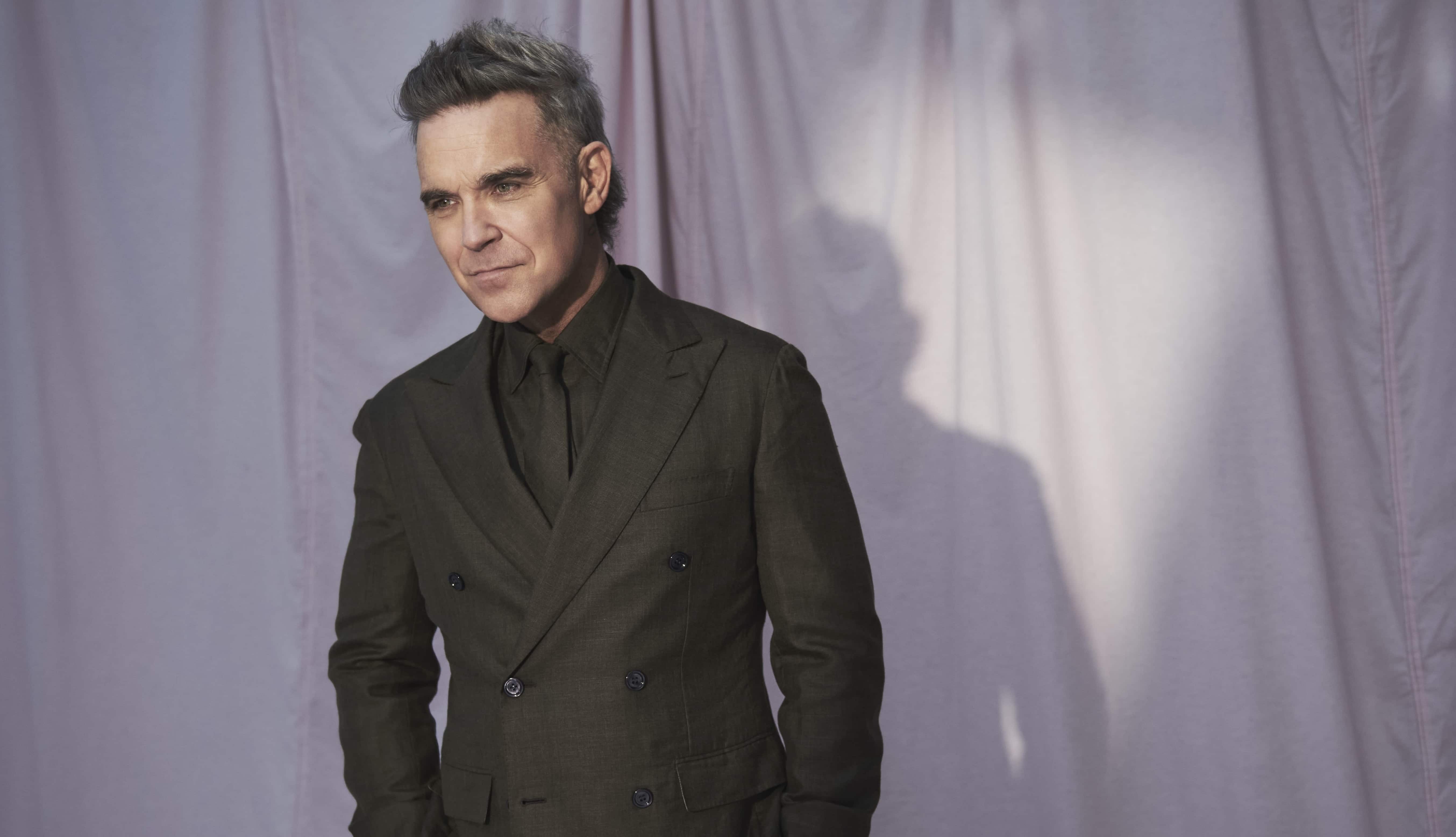 Robbie Williams llega al Estadio Bicentenario para presentar su disco Britpop